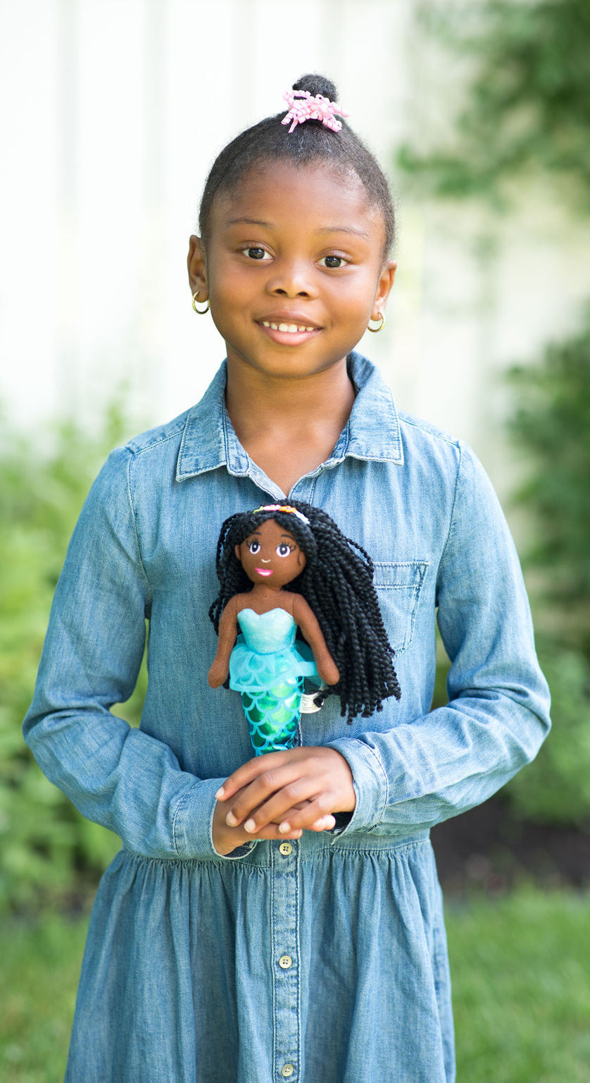 A Dark Brown Skin Tone Mermaid Doll